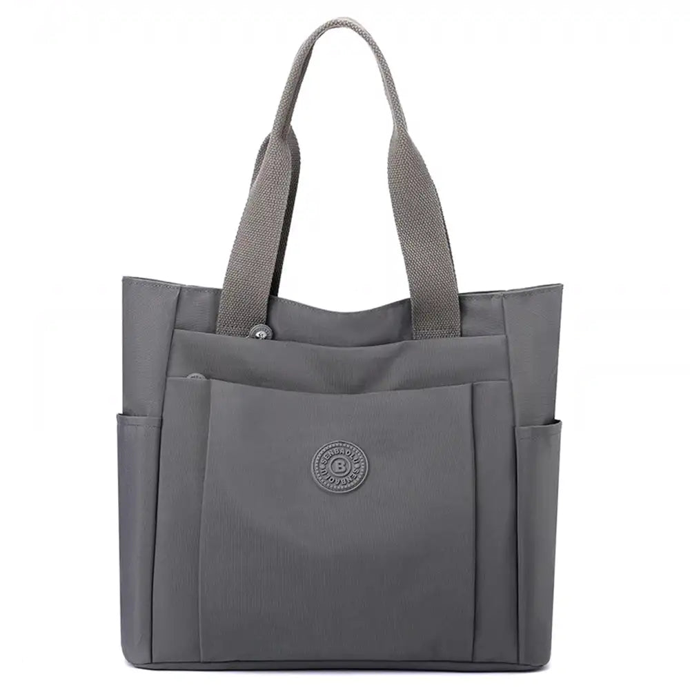 תיק צד יומיומי לעבודה וללימודים COOLPASE דגם Carry Travel Tote בצבע אפור כהה, עשוי בד אוקספורד דוחה מים, מבט מלפנים