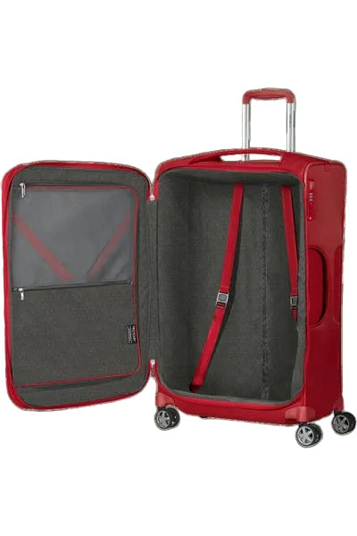 מזוודה גדולה Samsonite D'lite Spinner 78cm EXP פתוחה עם רצועות אלסטיות ותא רוכסן פנימי בבד אדום