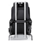 תיק גב Arctic Hunter City Hunter B00477 - רצועת הלבשה על מזוודת טרולי לנסיעות