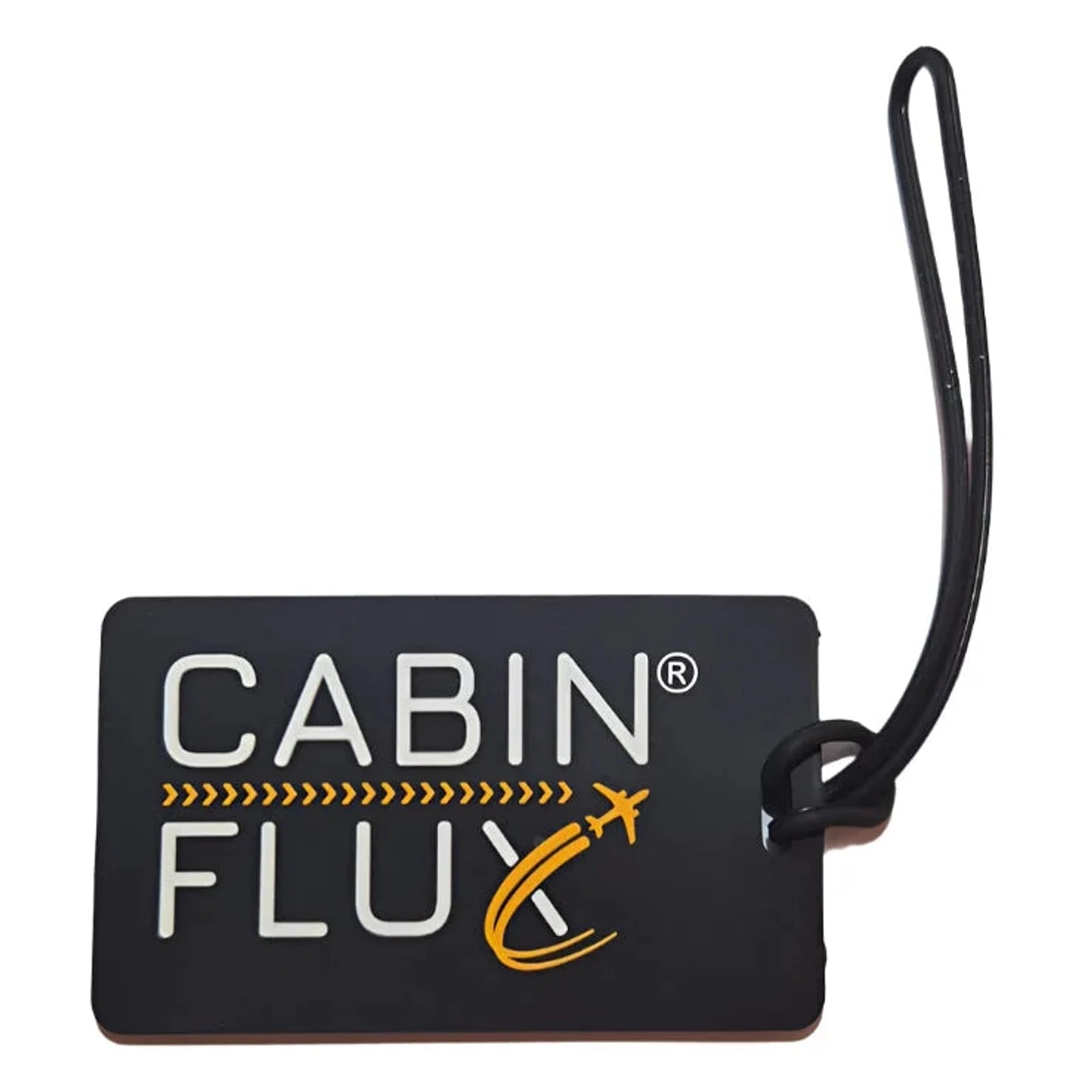 תג מזוודה שחור סיליקון CABIN FLUX, לוגו בולט בצד ולולאה שחורה עמידה לחיבור למזוודה, תקריב