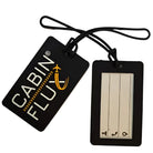 זוג תגי מזוודה שחורים סיליקון CABIN FLUX DUO ID, מבט מלמעלה עם חלון שקוף לפרטים ולולאה שחורה