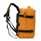 תיק עליה למטוס CABIN FLUX Iconic בצבע צהוב כאמל, מבט מהצד עם רצועות הידוק ואבזמים, עומק מורחב