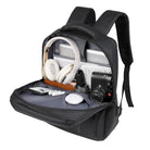 תיק גב CABIN FLUX Ranger במבט פתוח מלא המציג שני תאים עם לפטופ אוזניות מצלמה וציוד יומיומי