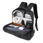תיק גב CABIN FLUX Ranger במבט פתוח מלא המציג שני תאים עם לפטופ אוזניות מצלמה וציוד יומיומי