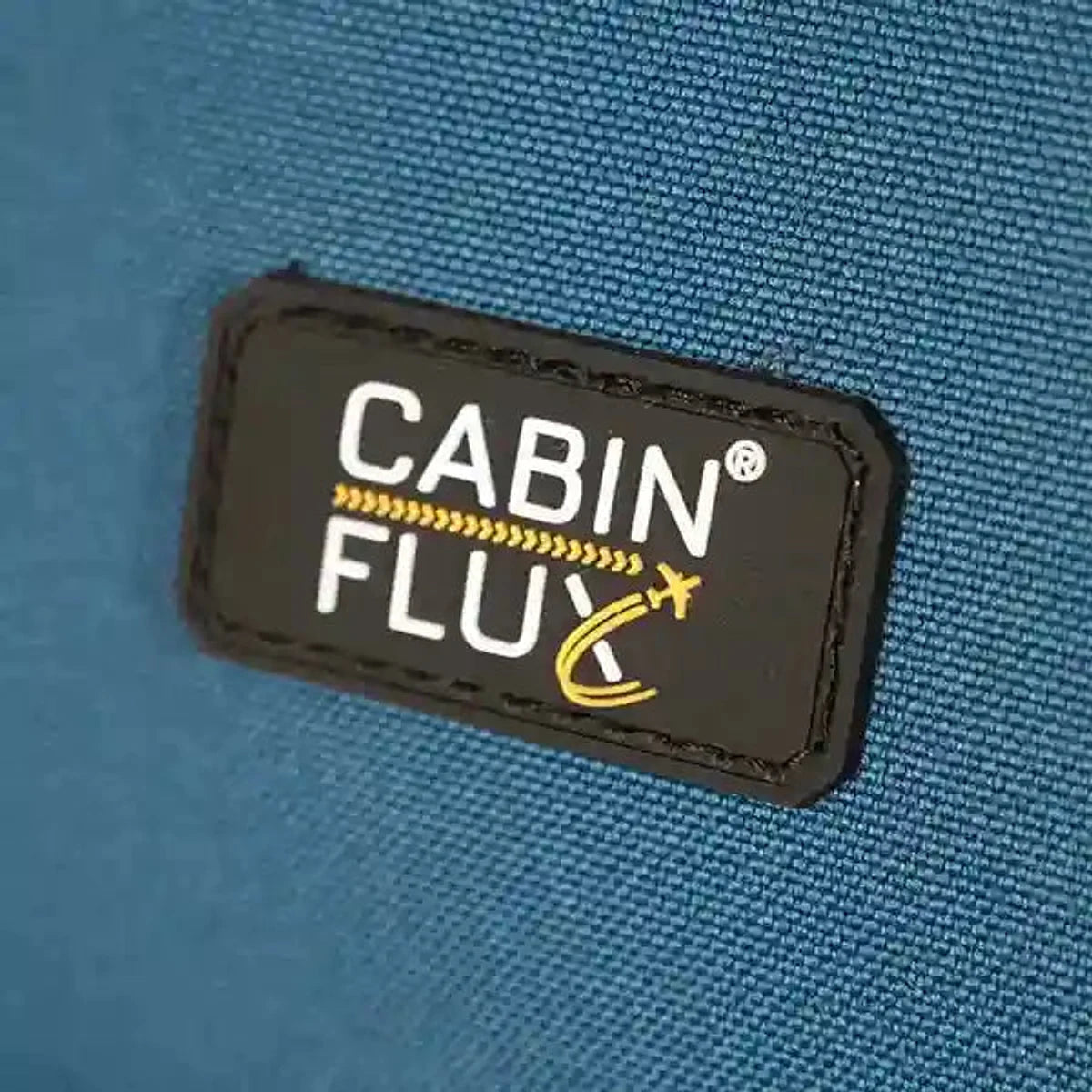 תווית גומי לוגו CABIN FLUX במזוודת Spirit C-Lite עשרים אינץ בכחול, בד Eva Composite עמיד דוחה מים