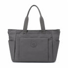 תיק צד יומיומי COOLPASE Carry Travel Tote בצבע אפור כהה - מבט קדמי, מתלבש על מזוודה עם כיסים מרובים