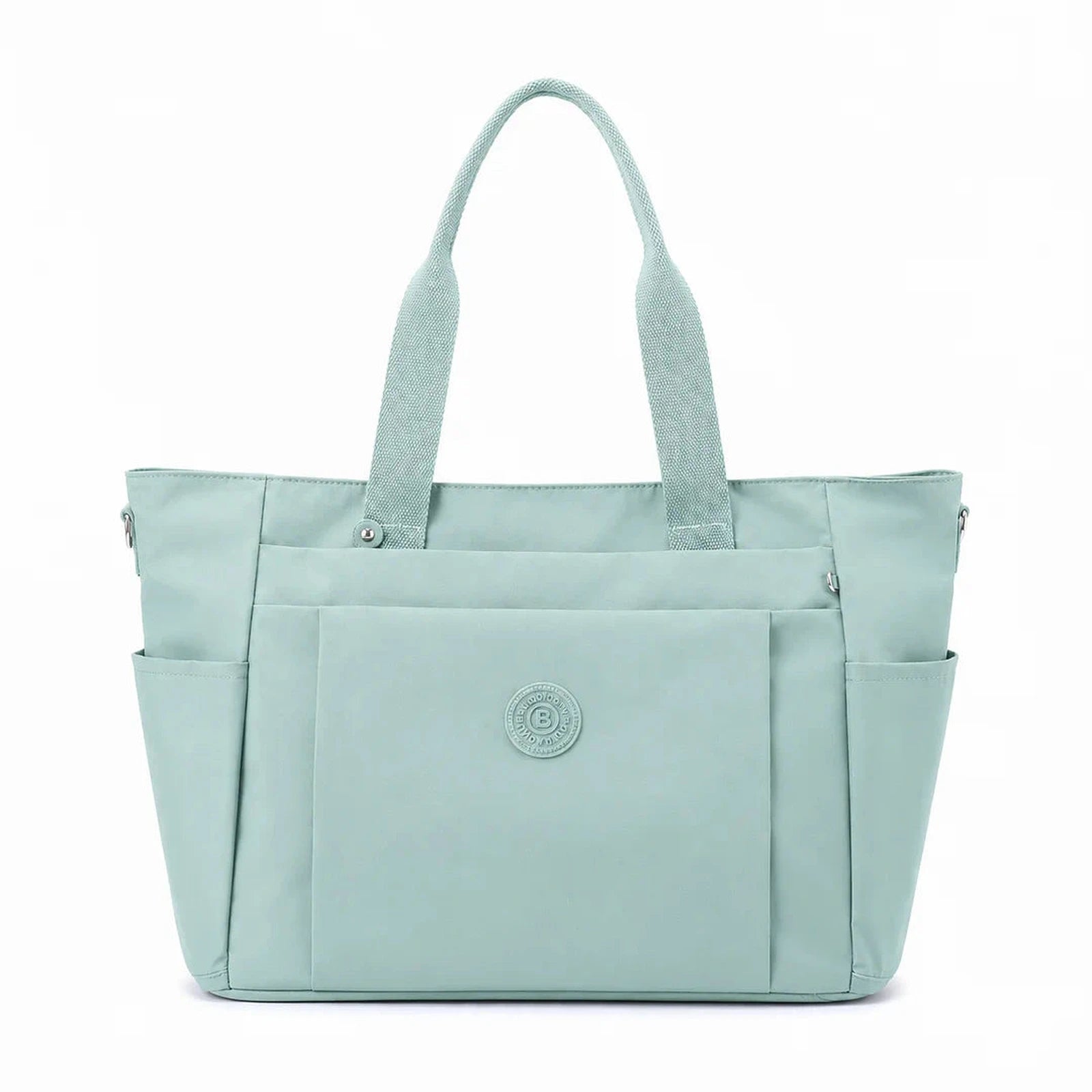 תיק צד יומיומי COOLPASE Carry Travel Tote בצבע מנטה - מבט קדמי, מתלבש על מזוודה עם כיסים מרובים