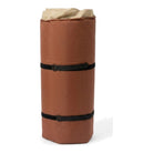 מזרן זוגי Go Nature Double Jumbo Mat מגולגל וקשור בשתי רצועות, תחתית בגוון חום-חלוד, מוכן לאריזה