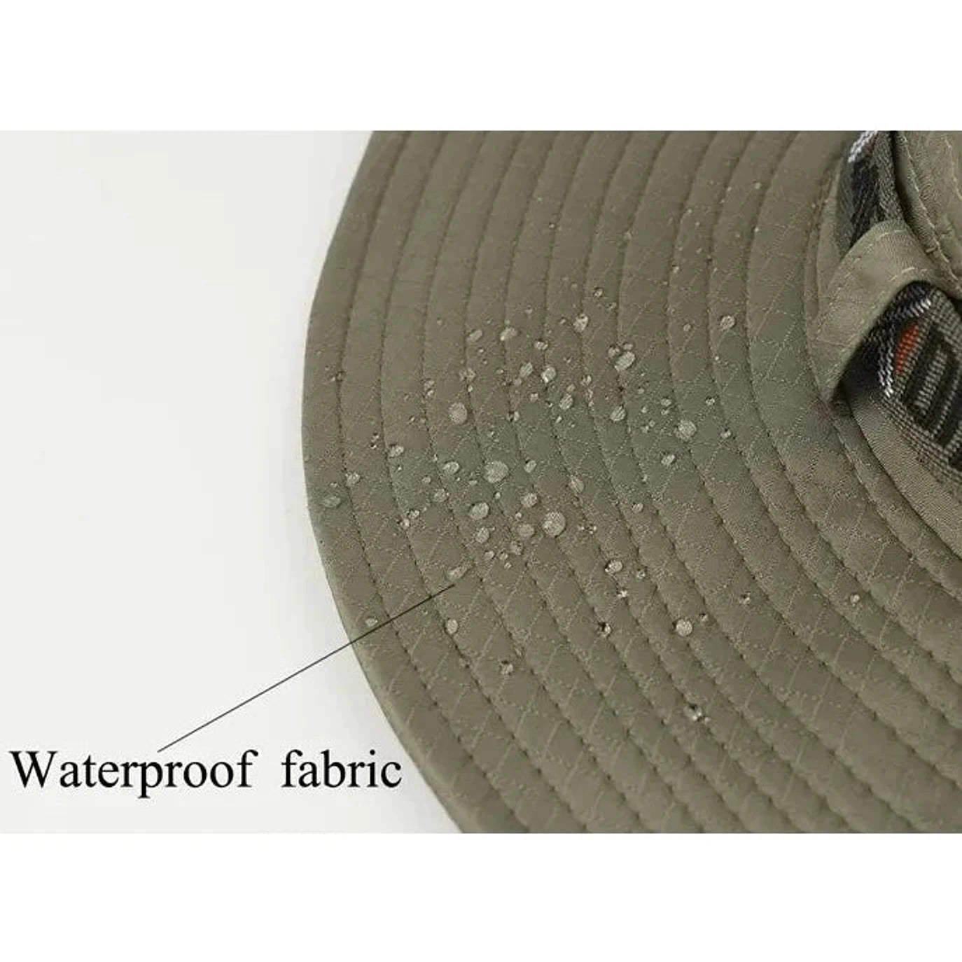הוכחת עמידות מים של כובע Metura DMF-X ירוק זית, בד WATERPROOF דוחה טיפות גשם בשטח