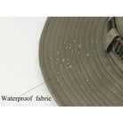 הוכחת עמידות מים של כובע Metura DMF-X ירוק זית, בד WATERPROOF דוחה טיפות גשם בשטח