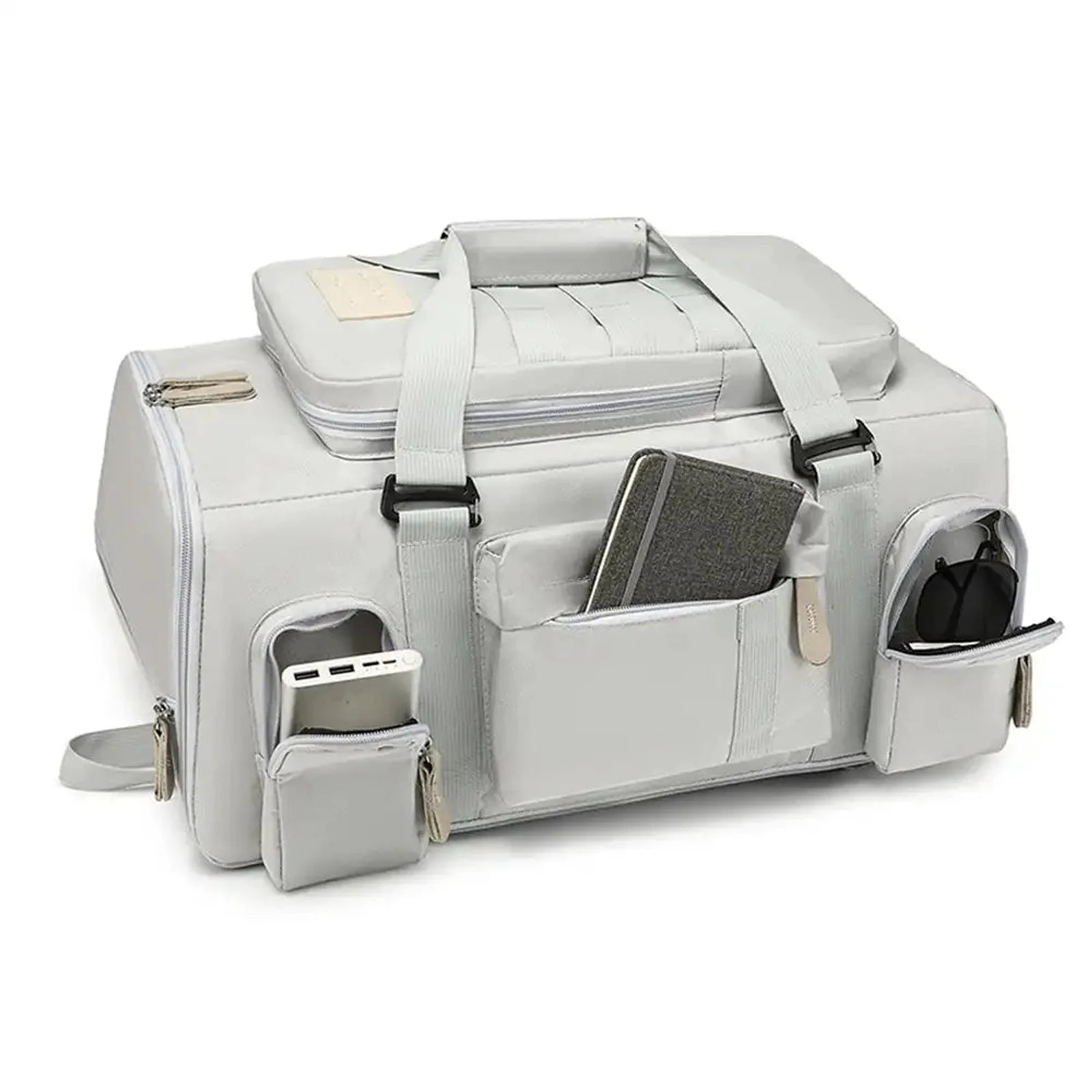 תיק עליה SanTiaoRen SkyPack 42L בצבע אפור במצב דאפל עם הדגמת תאי צד לסוללה, משקפיים ומחברת