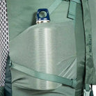 תרמיל טרקים TATONKA Pyrox 45+10 בצבע ירוק, כיס רשת צדדי גמיש עם בקבוק שתייה בגישה נוחה