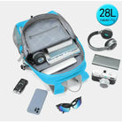 תרמיל נסיעות Tigernu Casual Sport T-B9500 נפח 28 ליטר, הדגמה לקיבולת מחשב נייד אוזניות ומצלמה בצבע תכלת