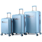 סט שלוש מזוודות קשיחות מתרחבות TUCCI דגם RECCOLTO בצבע תכלת, עיצוב איטלקי עם מנעול TSA וגלגלי ספינר, מבט תלת רבעי