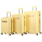 סט שלוש מזוודות קשיחות מתרחבות TUCCI דגם RECCOLTO בצבע צהוב, עיצוב איטלקי עם מנעול TSA וגלגלי ספינר, מבט תלת רבעי