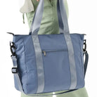 תיק צד YALUNDISI Tote Glossy Bag בצבע כחול, בד סטון ווש מבריק עמיד למים, רצועת כתף מתכווננת בשימוש